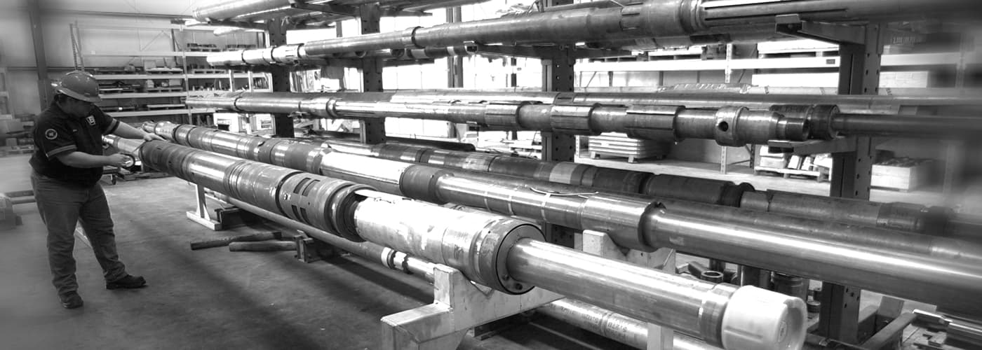 A man working on oil well packers